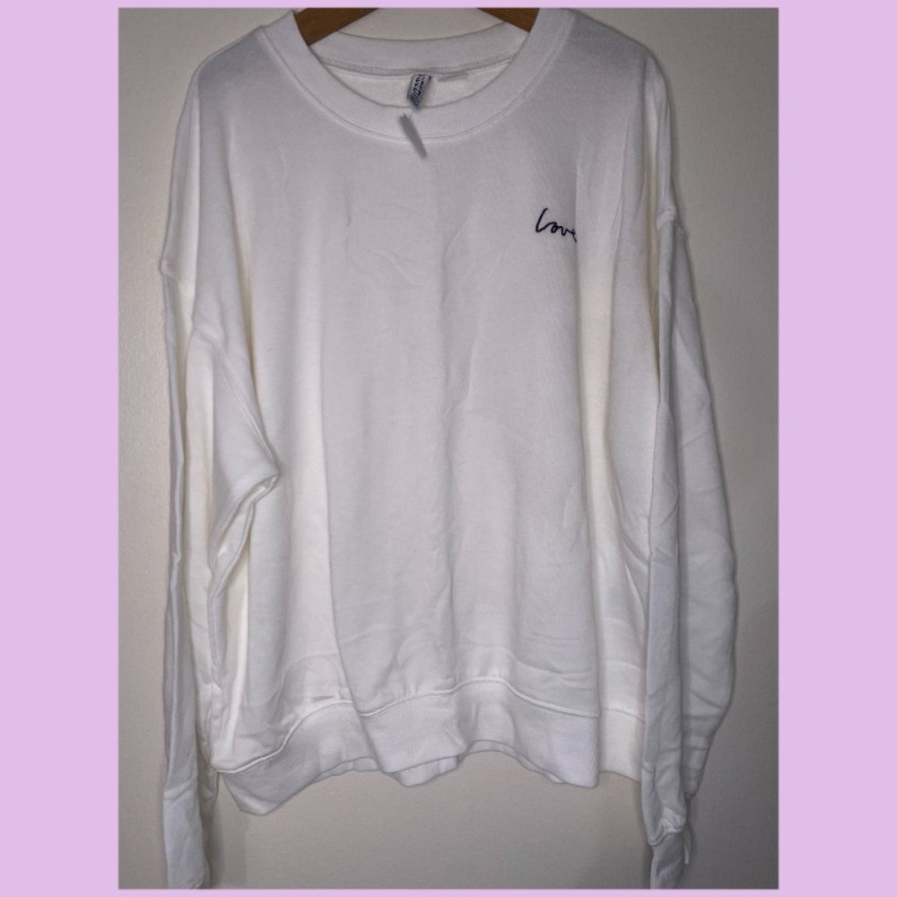 cosy white "love" sweater